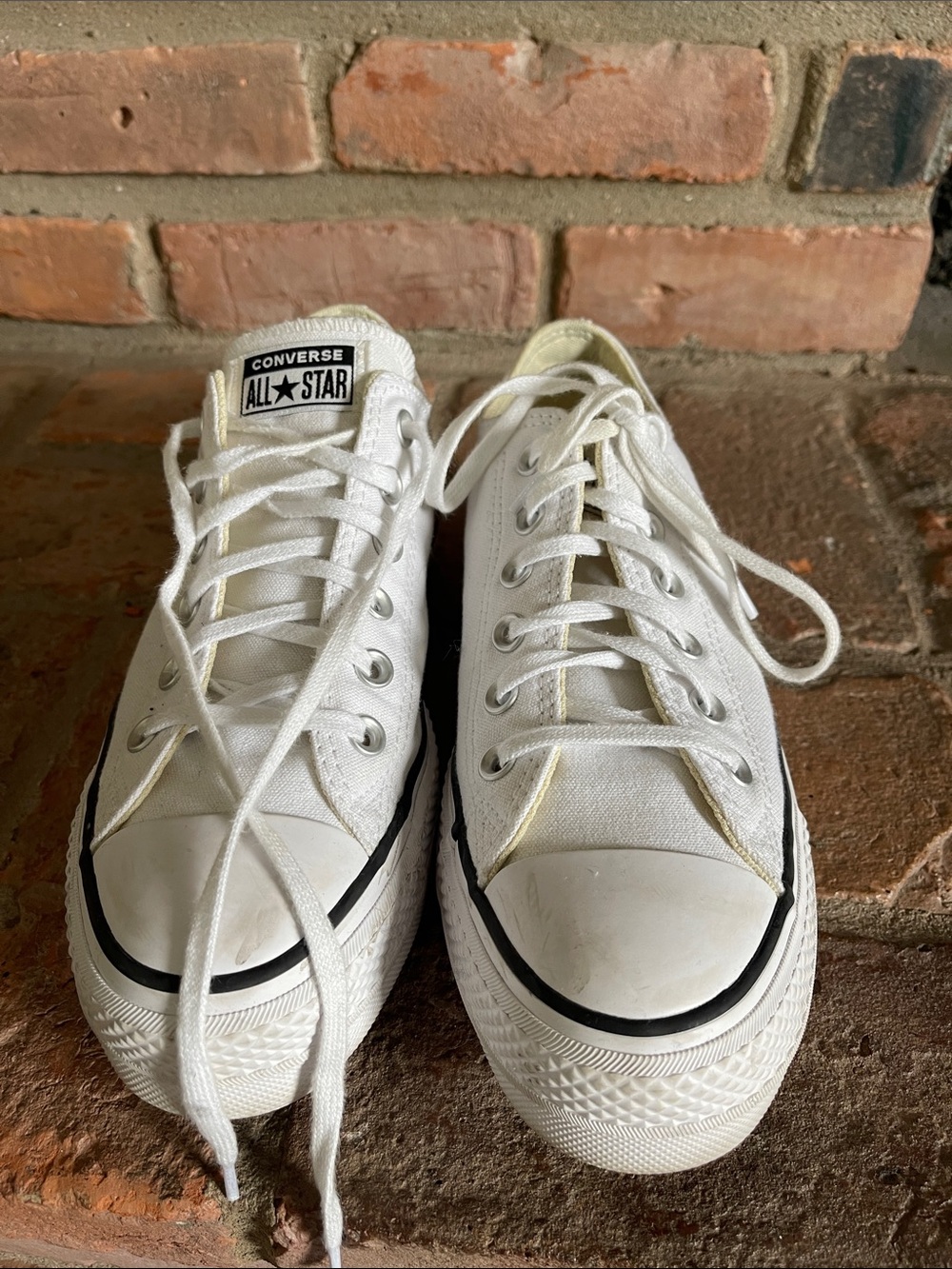 Converse White Low-Top Canvas Sneakers with Black Foxing
